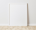 Blank Vertical white frame on wooden floor with white wall, 4:5 ratio - 40x50 cm, 16 x 20 inches - PhotoDune Item for Sale