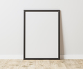Blank Vertical black frame on wooden floor with white wall, 3:4 ratio, 30x40 cm, 18x24 inches - PhotoDune Item for Sale
