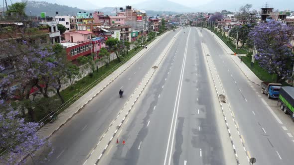 An aerial flight over the empty ring road in the city of Kathmandu, Nepal.