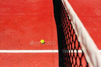 near the net after losing a match point.