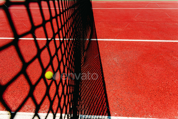 near the net after losing a match point.