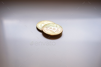 Two cryptocurrencies golden bitcoin, new economy, with negative space.