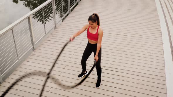 Aerial shot of a woman working out in the park