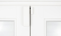 Wireless alarm sensor for window and door on white wooden sash - PhotoDune Item for Sale