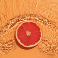 Grapefruit citrus fruit in fresh water with waves on bright background. - PhotoDune Item for Sale