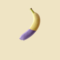 Banana in paint on a yellow background. - PhotoDune Item for Sale