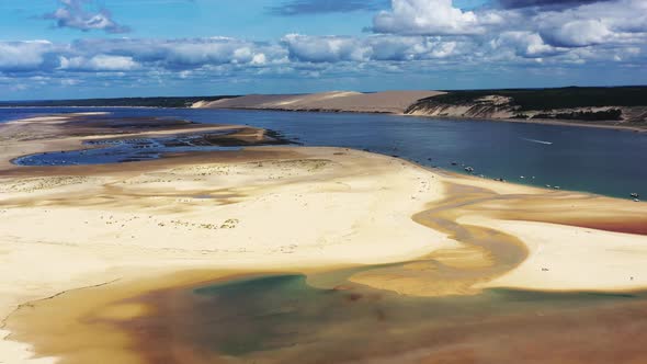 Banc d'Arguin in Arcachon France flooded with boats on the shore at the south passage, Aerial dolly