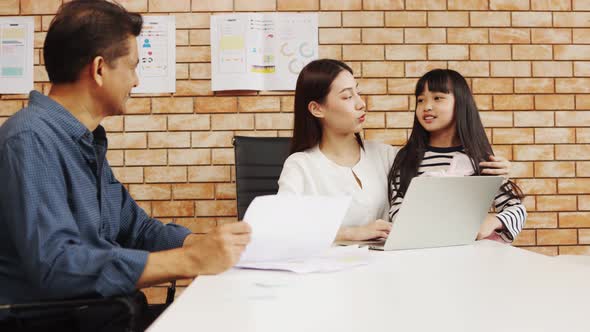 Businesspeople smiling coworking and showing growth graphic and taking a business