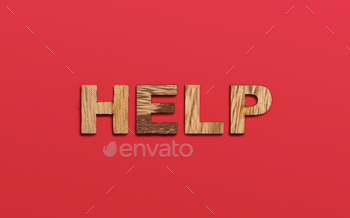 Help, word written in wooden alphabet letters on red background. Support and assistance to people