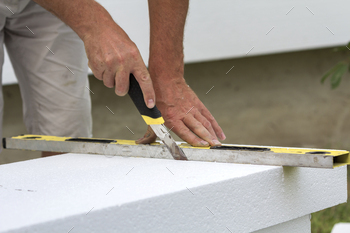ng white rigid polyurethane foam sheet for house insulation. Modern technology, renovation, professional job, alternative for mineral wool concept.