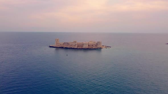 Aerial footage shows Maiden Castle or Deniz kalesi or Kizkalesi. Mersin, Turkey