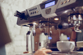 Professional coffee machine with dripping water in cafeteria - PhotoDune Item for Sale