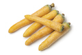 Fresh raw yellow carrots on white background close up - PhotoDune Item for Sale