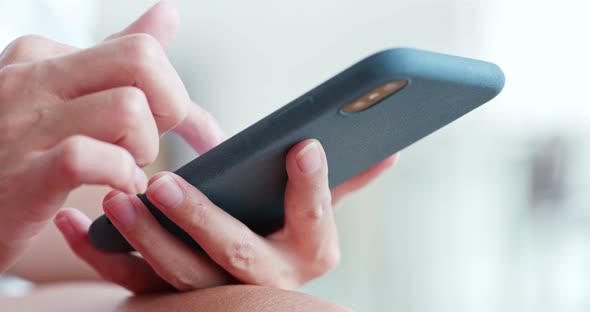 Close up of woman use of mobile phone