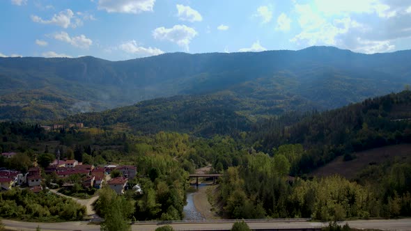 steep green mountains, deep forest and mountain road, beautiful valley and river