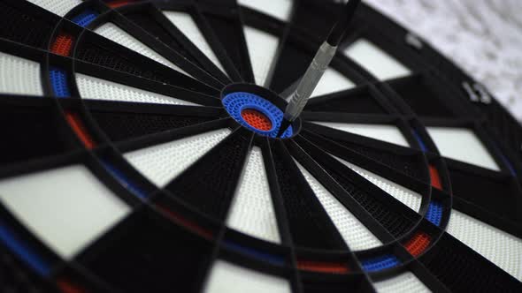 Three bull's-eye hits in darts