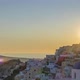 Sunset Over the Rooftops of Oia on the Island of Thira - VideoHive Item for Sale