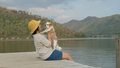 Asia woman people enjoy staycation pet owner getaway good time day with small puppy - PhotoDune Item for Sale