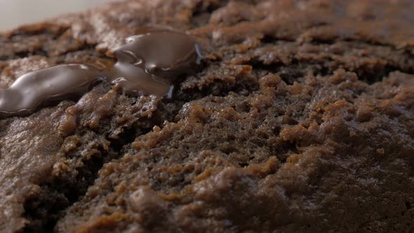 Chocolate cake glazed on top 4K 3840X2160 UltraHD footage - Adding melted chocolate on top of tasty 