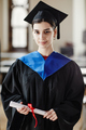 Portrait of Young Woman Graduating College - PhotoDune Item for Sale