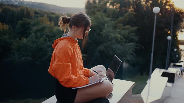 Young Woman Planning Her Actions for the Next Work Week