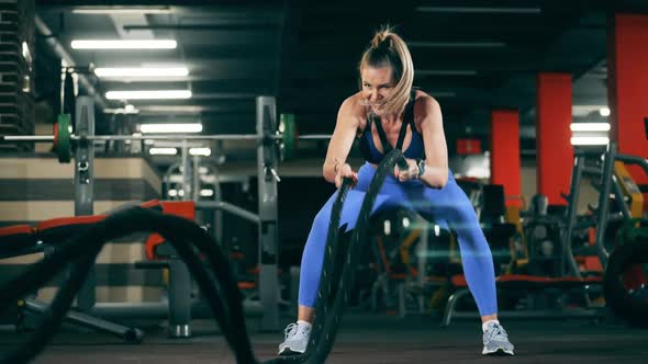 Female Athlete Workouts with Battle Ropes.