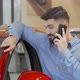 Bearded Man Talking on His Phone at Car Dealership - VideoHive Item for Sale