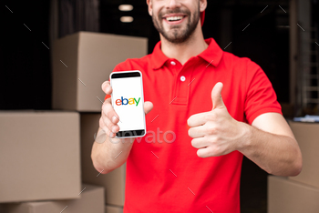 one with ebay logo on screen showing thumb up