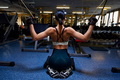 Athletic woman in the gym showing muscles - PhotoDune Item for Sale