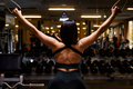 Young woman in the gym showing muscles - PhotoDune Item for Sale