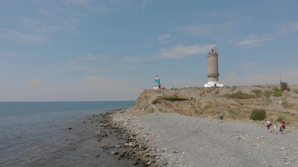 Aerial View of Lighthouse at Sea on Coastline