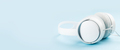 Headphones over blue background - PhotoDune Item for Sale