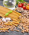 Pasta different whole grain and rye on black board - PhotoDune Item for Sale