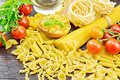 Pasta different with oil and tomatoes on table - PhotoDune Item for Sale
