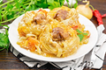 Pasta with meatballs in plate on dark board - PhotoDune Item for Sale