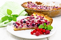 Pie with raspberries and currants in plate on board - PhotoDune Item for Sale