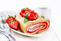 Roll with cream and strawberries in plate on white board - PhotoDune Item for Sale