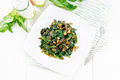 Spinach fried with onions in plate on board top - PhotoDune Item for Sale