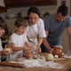 Children Helping Parents to Preparing a Dough in Domestic Kitchen - VideoHive Item for Sale