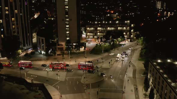 Forwards Fly Above City Street