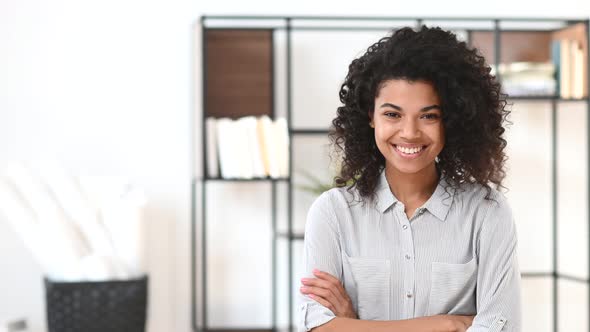 An AfricanAmerican Young Woman in the Modern Office Space