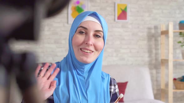 Muslim Woman in a Headscarf and Writes a Blog Slow Mo