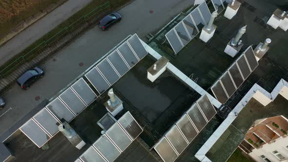 Drone Shot on Modern Multiapartment Buildings with Solar Panels on the Roofs