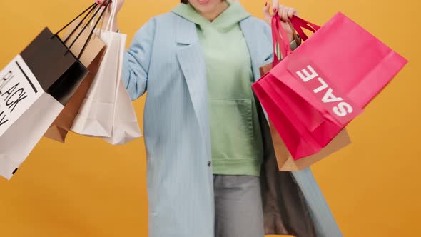 Black Friday Video Footage - A Woman Enjoying Her Shopping Spree On Black Friday