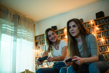 Two best friends playing video games