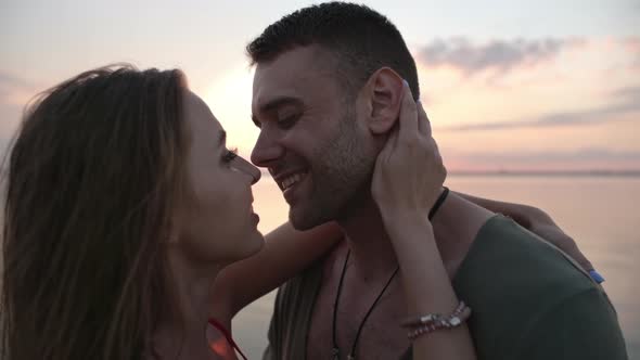 Affectionate Couple Kissing on Romantic Date