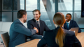 A group of people at a business meeting. Handshake of successful business people - PhotoDune Item for Sale