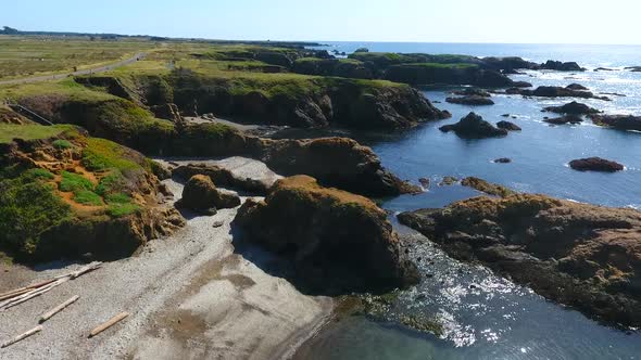 Panning Over Stunning Coastal Beaches of California with Rocky Coast