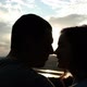 Young Couple Kissing Noses and Smiling at Sunset - VideoHive Item for Sale