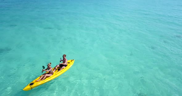 Happy people married on vacation live the dream on beach on sunny white sandy 4K background